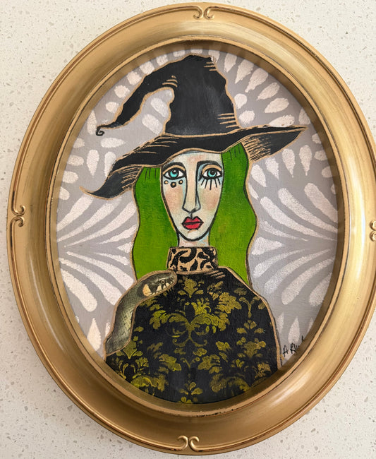 Original,signed oval Witch painting & mixed media on canvas board in gold frame11x13”