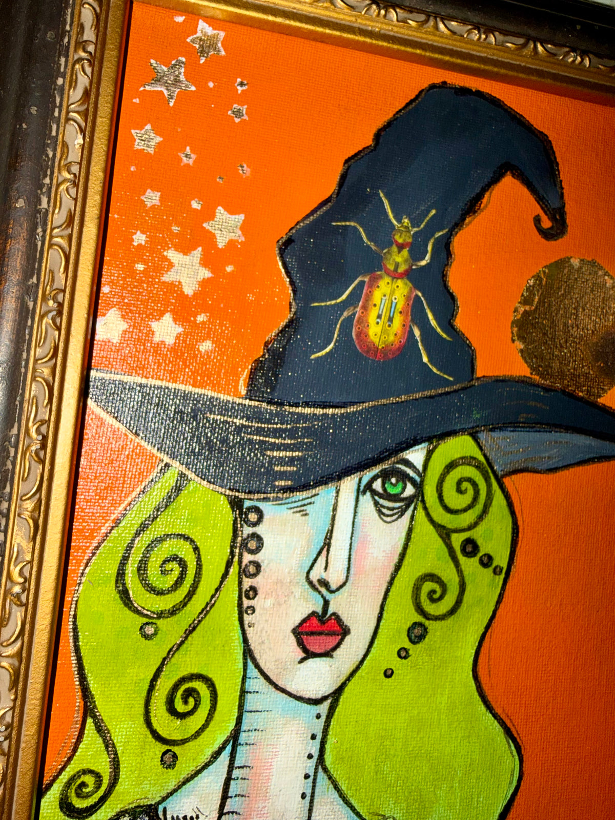 Original,signed mini Witch painting on canvas board in frame 10x15”