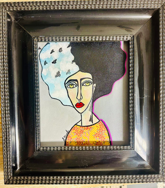 Original painting on canvas board in black frame, 13x14” Abstract portrait w/collage